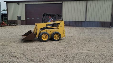 john deere jd24 skid steer